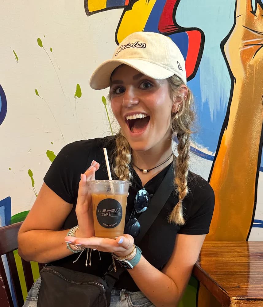 Maiya posing on a dock at sunset