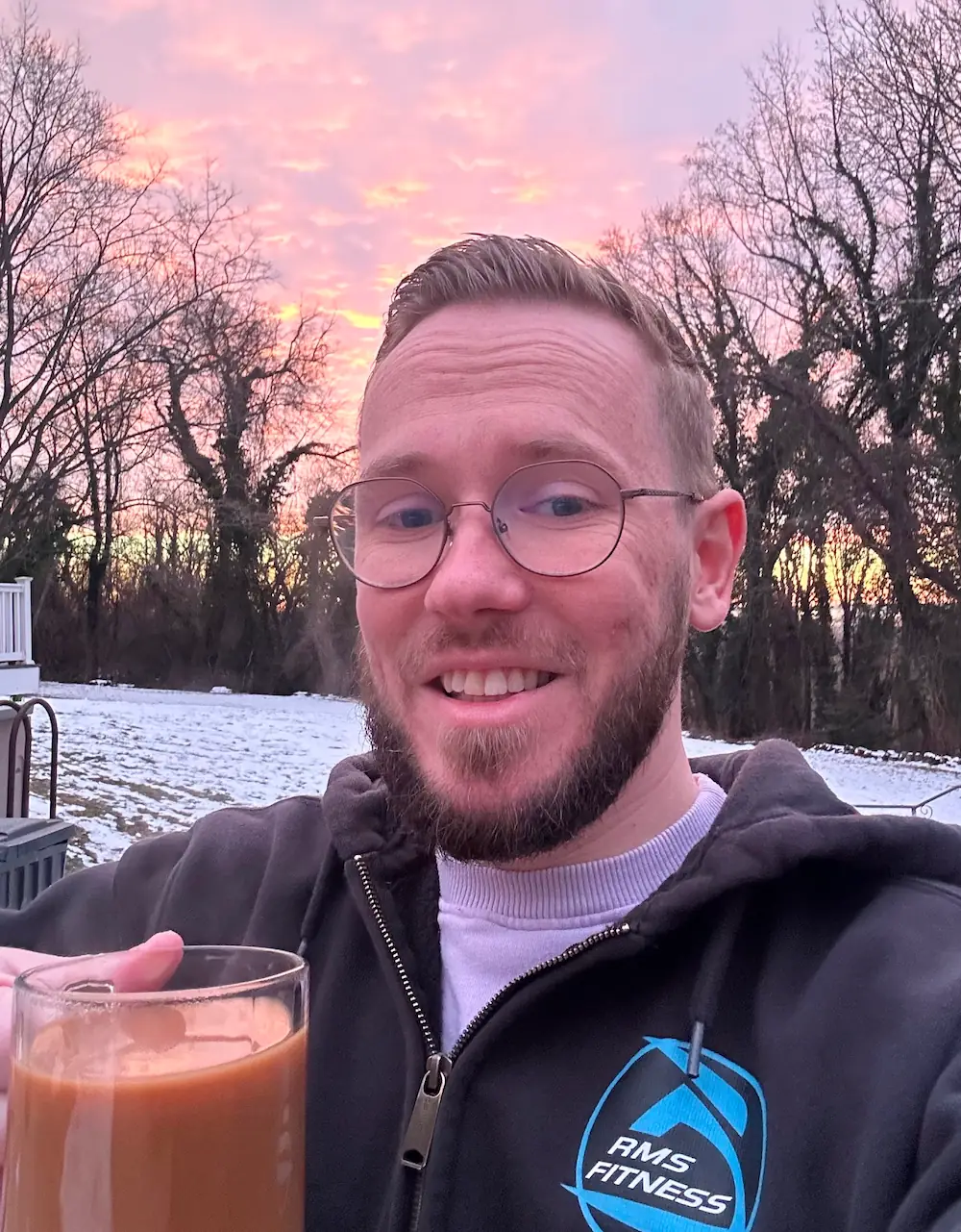Steve Heitzer outdoors with trees in the background